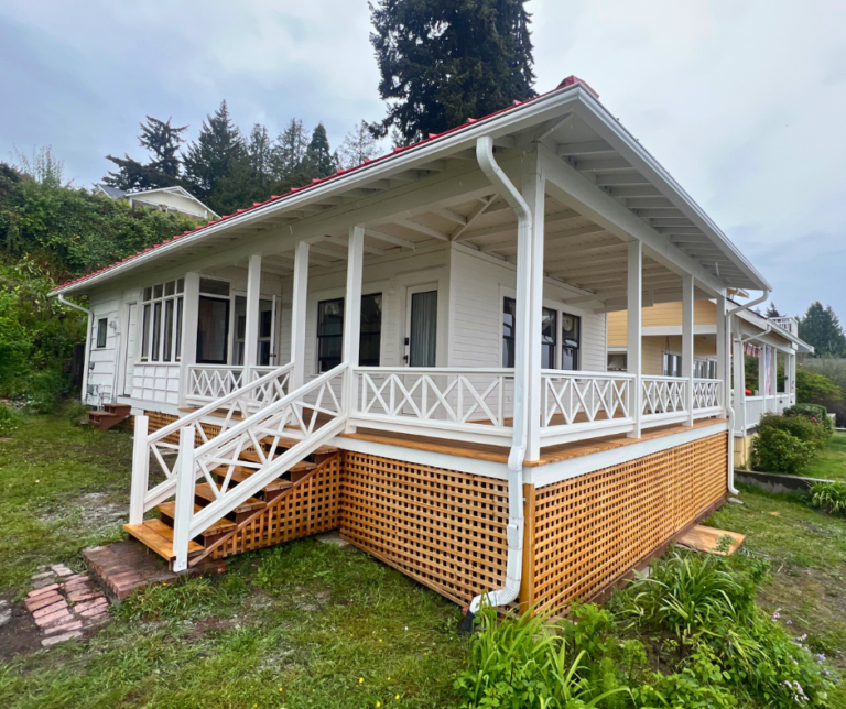 After: repainted porch railings and lattice