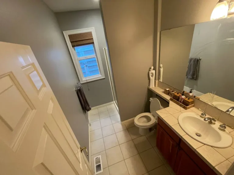Before: dated Renton bathroom