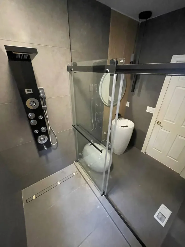 After: modern shower and fixtures