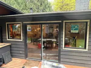 New large windows in living room restoration flooding space with natural light