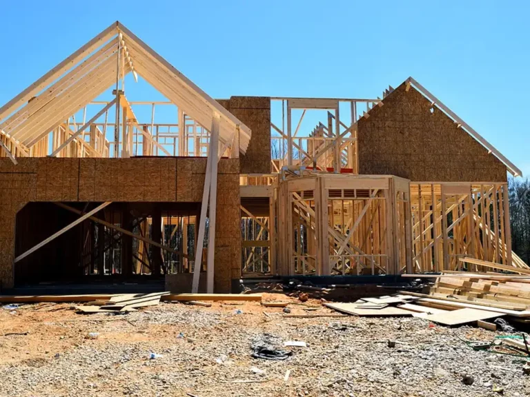 Wood frame construction of a two-story house addition in Seattle, WA