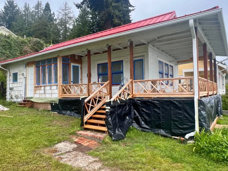 Before: cottage with failing gutters