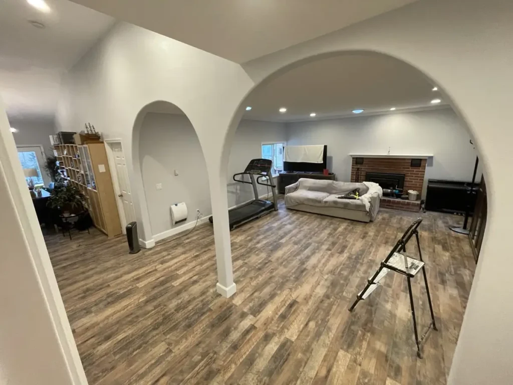 Living room after wood flooring arches — Inreal Construction