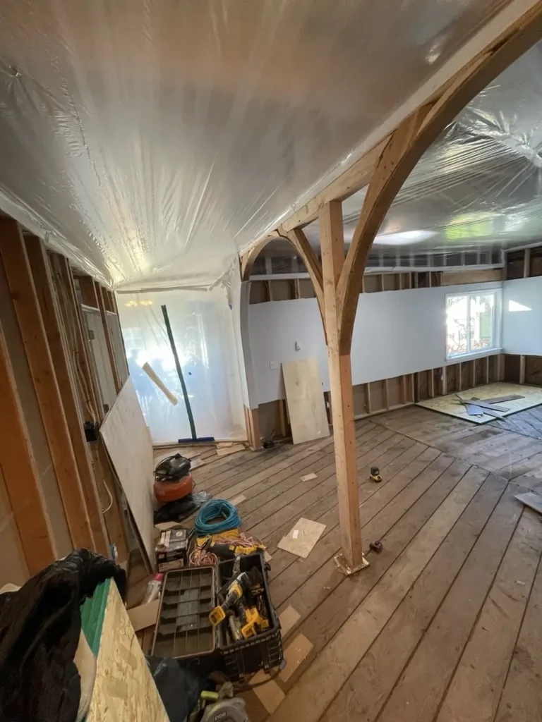 Before: living room down to subfloor