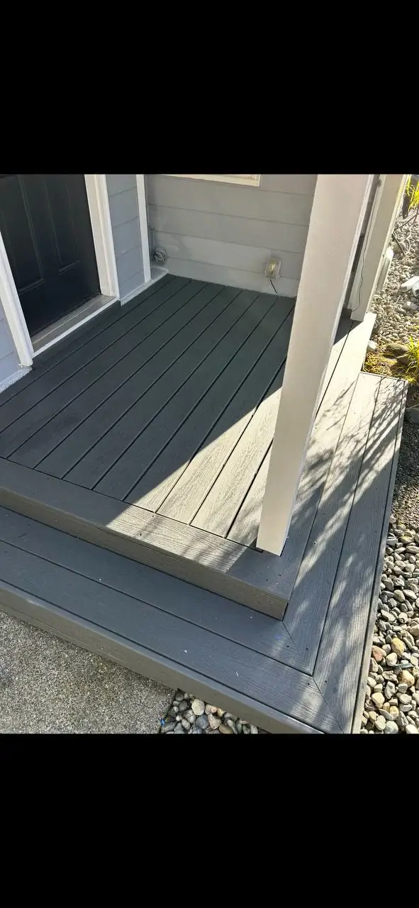Covered entry porch with composite decking in Washington
