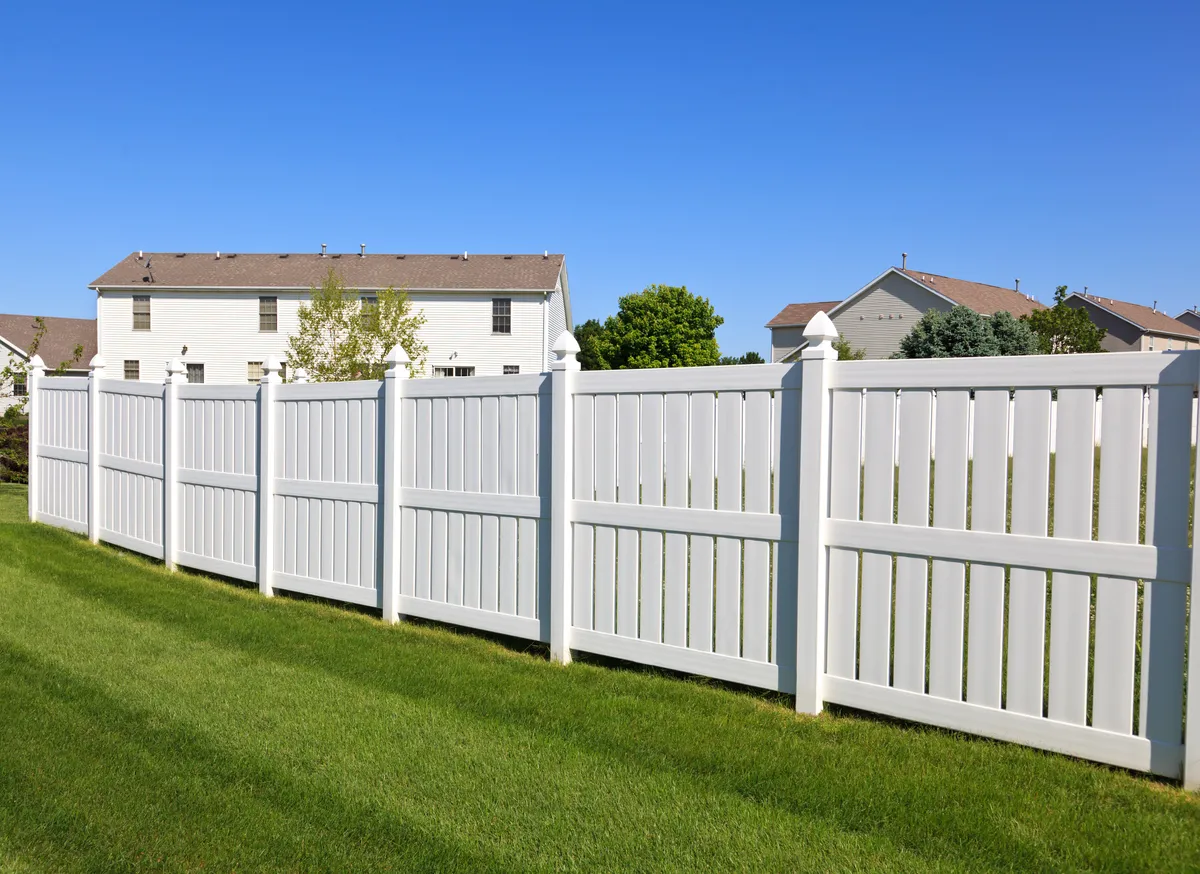 White vinyl privacy fence on the Eastside